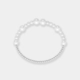 Stunning bracelet featuring white freshwater pearls and luxurious 18k white gold beads, a timeless accessory.