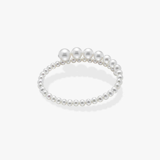 Stunning pearl bracelet against a white backdrop, a timeless piece that exudes class and elegance.