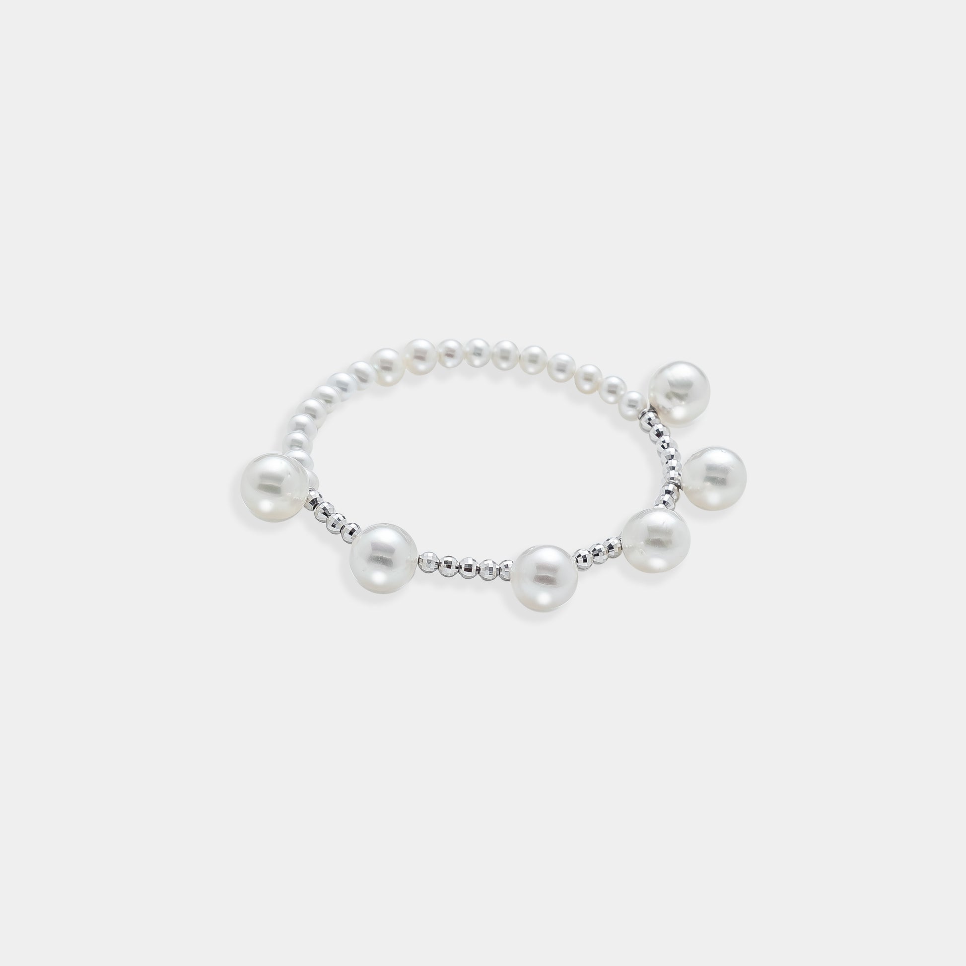 Exquisite pearl ring with a dazzling white gold beads, perfect for adding elegance and sophistication to any occasion.