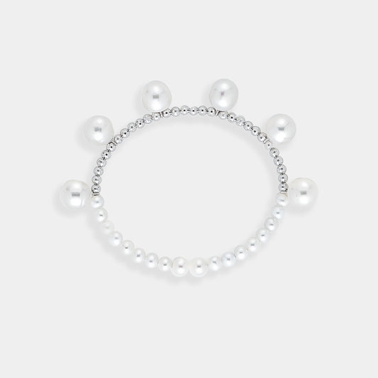 Exquisite pearl ring with a dazzling white gold beads, perfect for adding elegance and sophistication to any occasion.