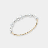 Exquisite bracelet of freshwater pearls and gold beads, made with premium 18k yellow gold.