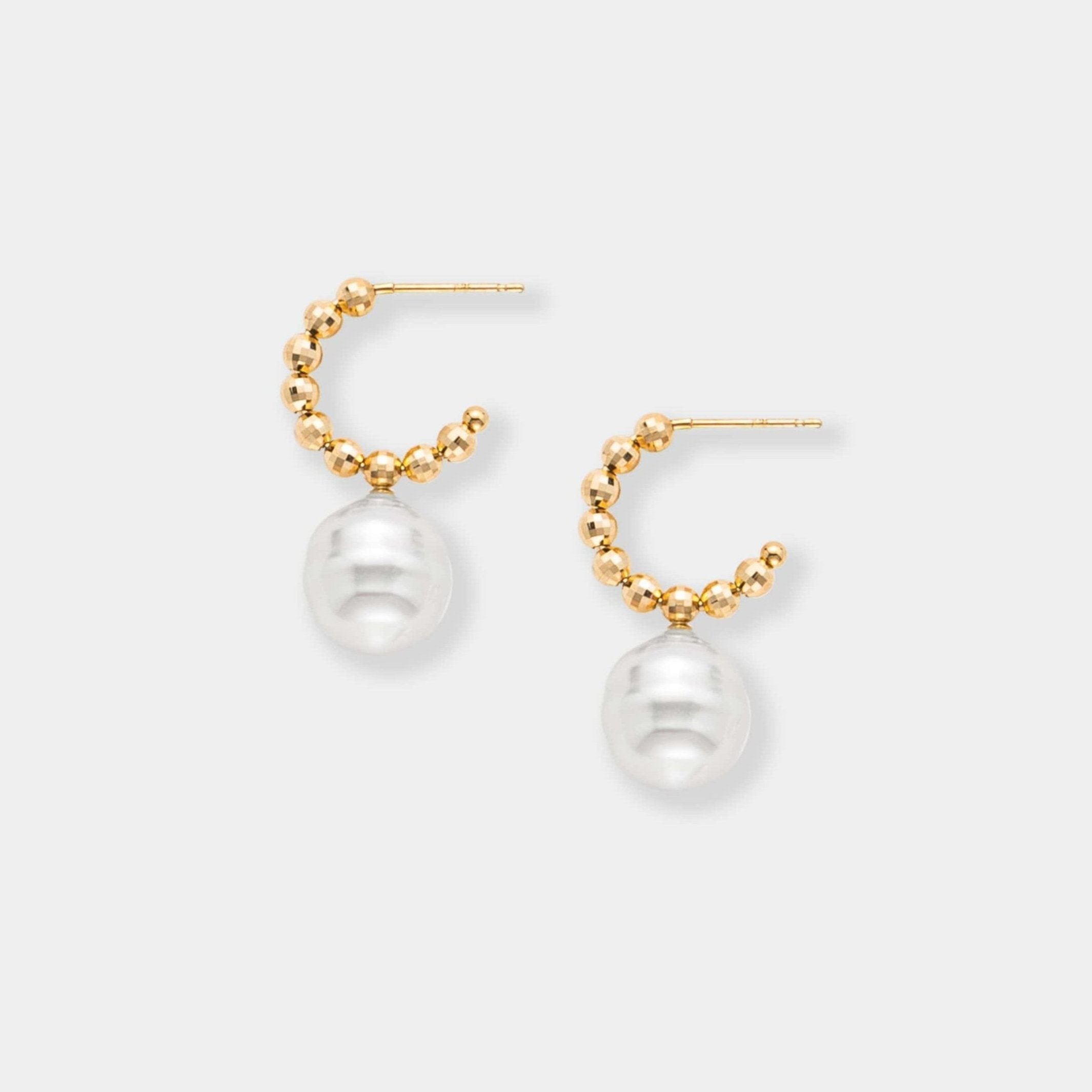 Elegant gold hoop earrings featuring a South Sea pearl and shimmering gold beads, crafted in luxurious 18K yellow gold.