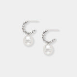 Indulge in timeless beauty with these stunning white pearl and white gold beads earrings. Elevate your style effortlessly.