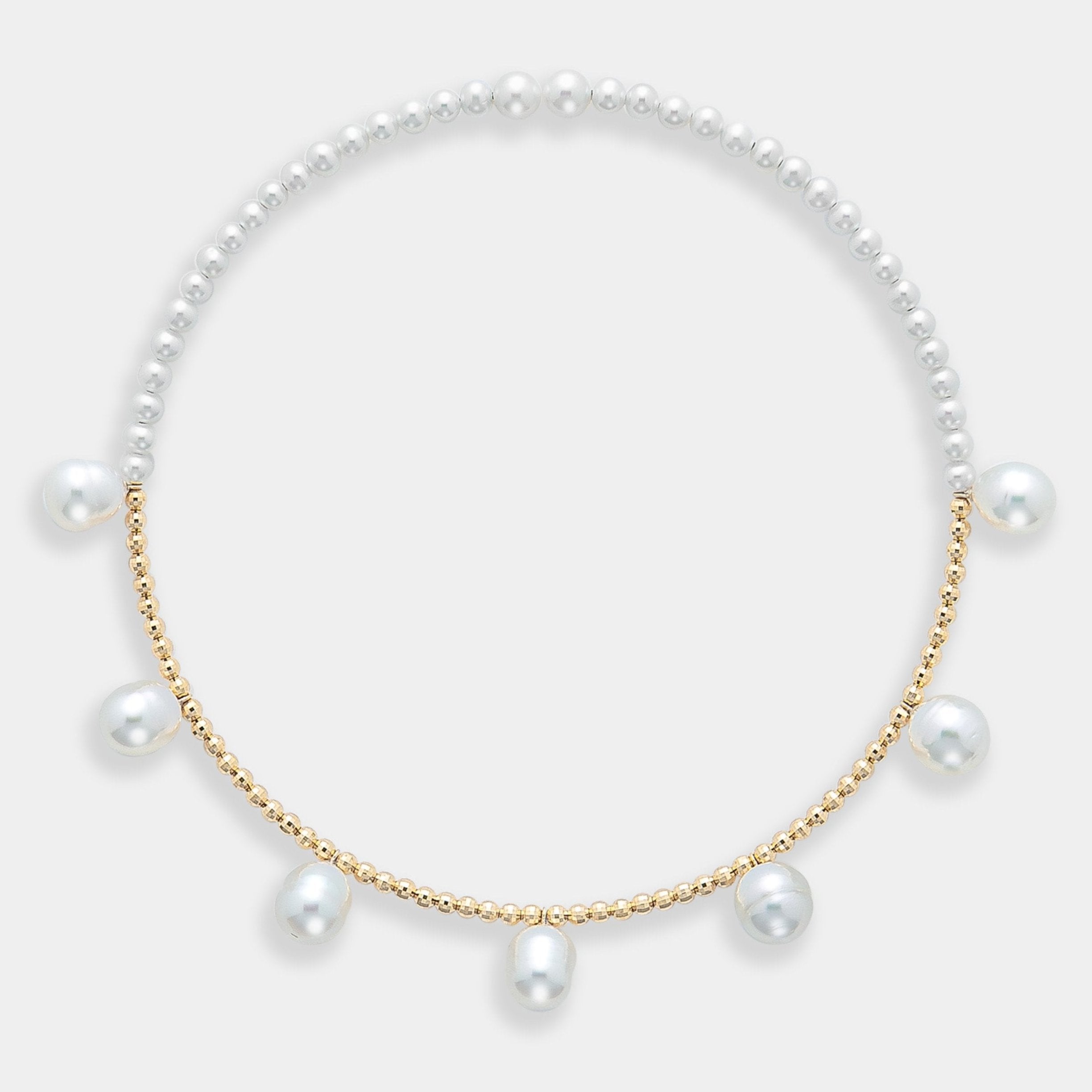 Enhance your elegance with a stunning Pearl Dot x Gold Choker, featuring a pearl necklace adorned with gold beads and pearls.