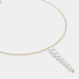 A luxurious 18K yellow gold necklace adorned with a beautiful freshwater pearl drop, ideal for enhancing your style.