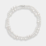 Elegant long freshwater pearl necklace with a silver clasp, a timeless accessory.