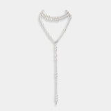 Elegant long necklace featuring freshwater pearls and silver accents, beautifully displayed on a pristine white background.