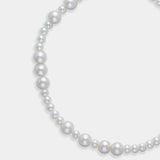 Stunning white freshwater pearl necklace with a sleek silver clasp, ideal for elevating your jewelry collection.