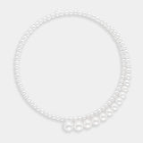 Spiral necklace using white fresh water pearls, using 14K white gold.