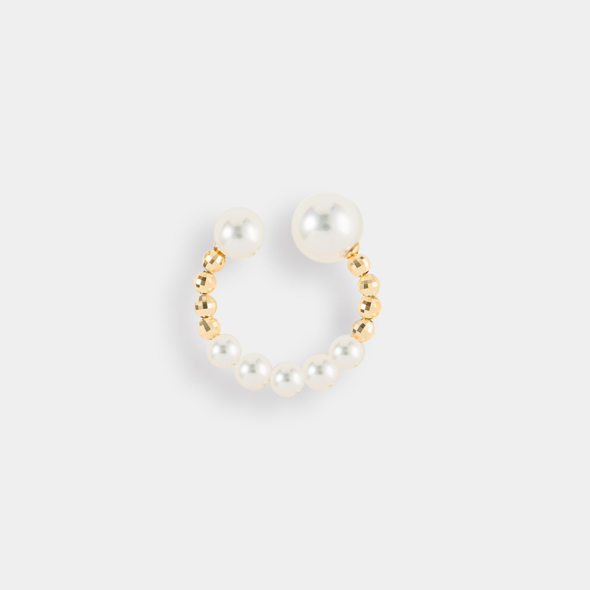 Enhance your elegance with a stunning gold and white pearl ring & earcuff. Perfectly complemented by a Twin Pearl Earcuff.