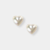 Enhance your elegance with these exquisite white heart-shaped pearl stud earrings. Perfect for any occasion!