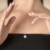 Elevate your style with a woman showcasing a gold star pendant necklace, radiating sophistication.