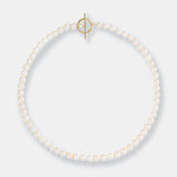 An exquisite pearl bracelet featuring a gold clasp and a delicate pearl, complementing the Mantel Pearl Necklace Short.